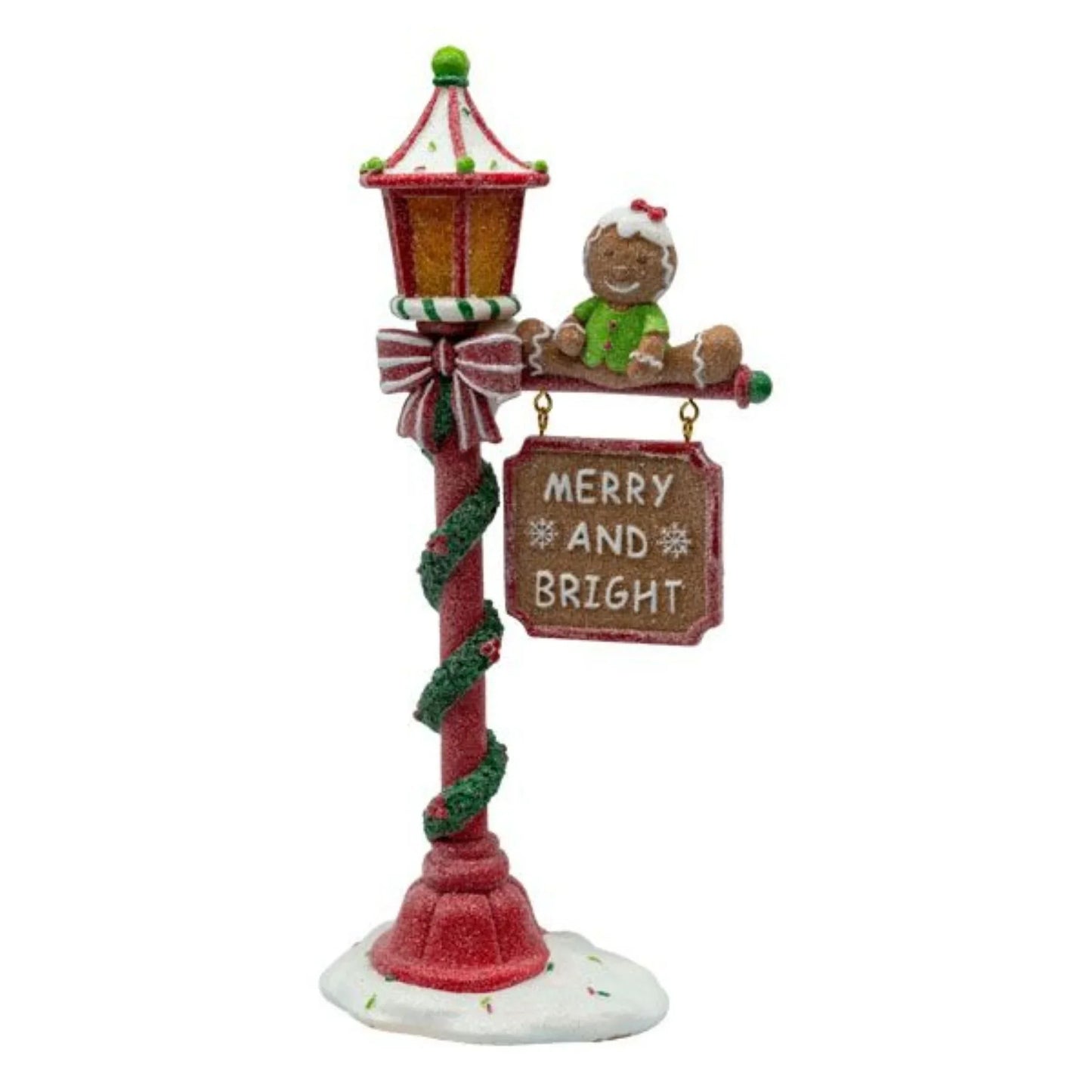 Gingerbread figurine on festive lamp post with 'Merry and Bright' sign, holiday décor