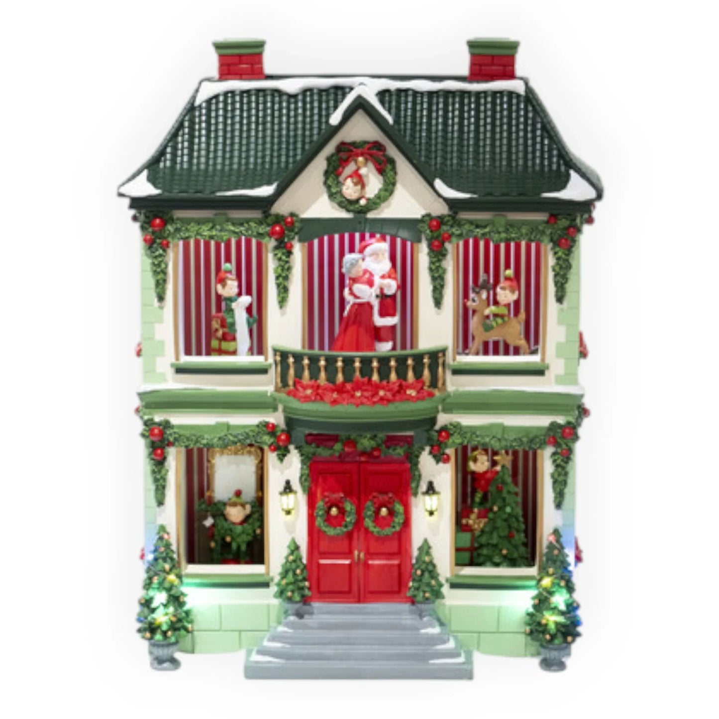 Christmas village house with Santa, elves, wreaths, and lit trees, perfect for holiday home décor