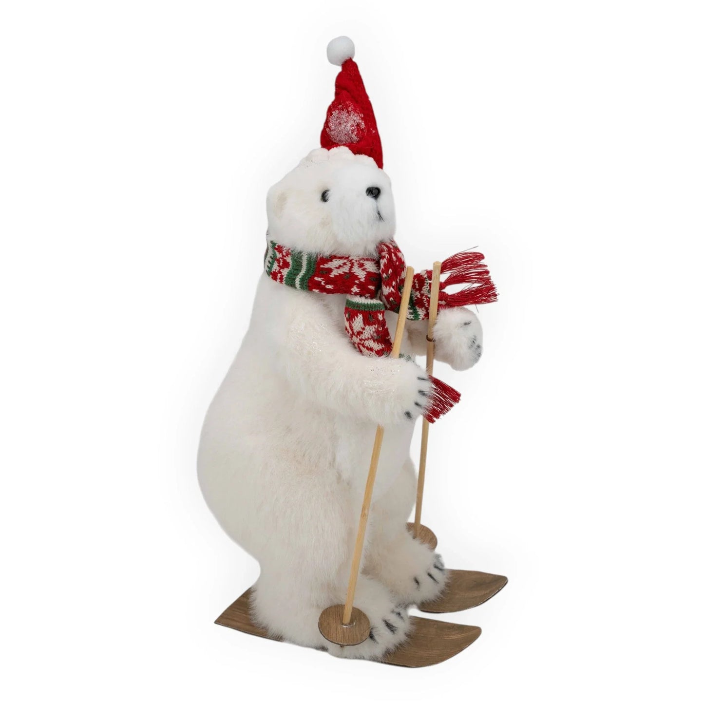 Festive polar bear figurine skiing with red hat and scarf, holiday home décor accent