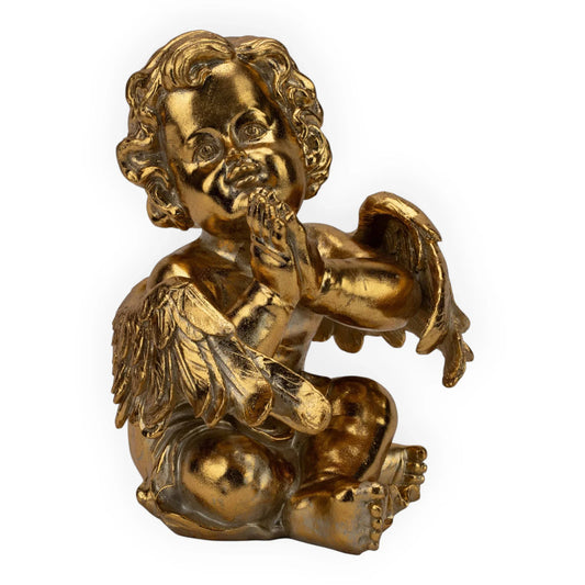 Golden cherub angel statue with wings, perfect for vintage home décor and elegant interior accents.