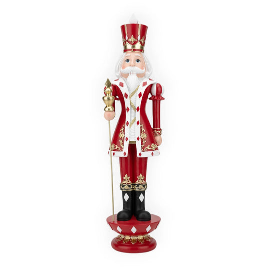 Red and gold nutcracker soldier with crown, holding scepter, festive holiday home décor