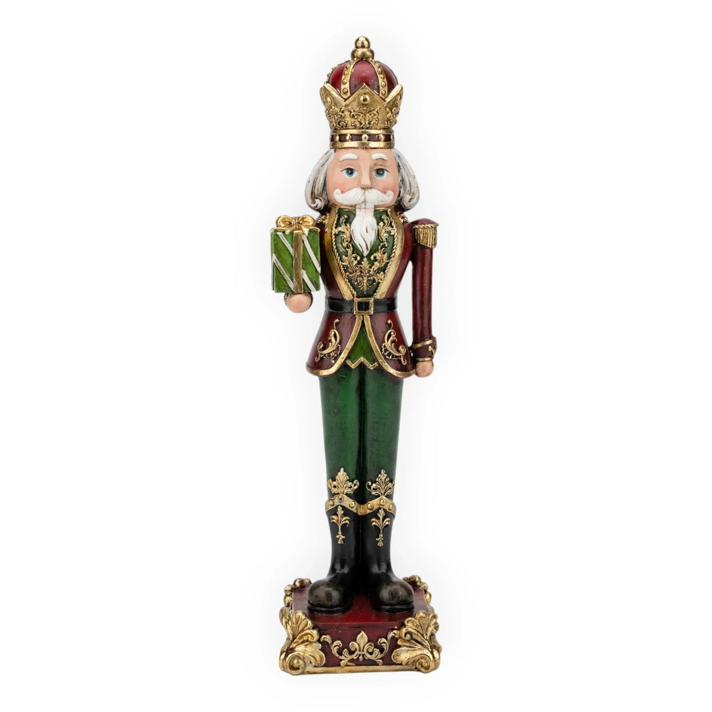Royal nutcracker figurine with crown, holding gift, festive holiday home decor