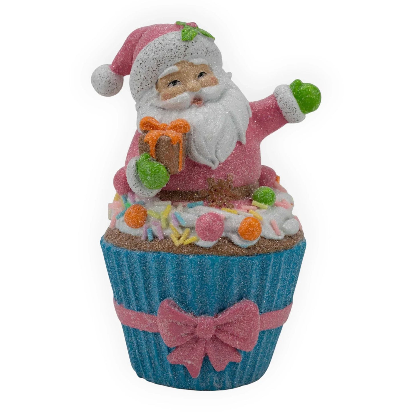 Glittery Santa figurine on a colorful cupcake with sprinkles, perfect for festive home décor and holiday gifts.