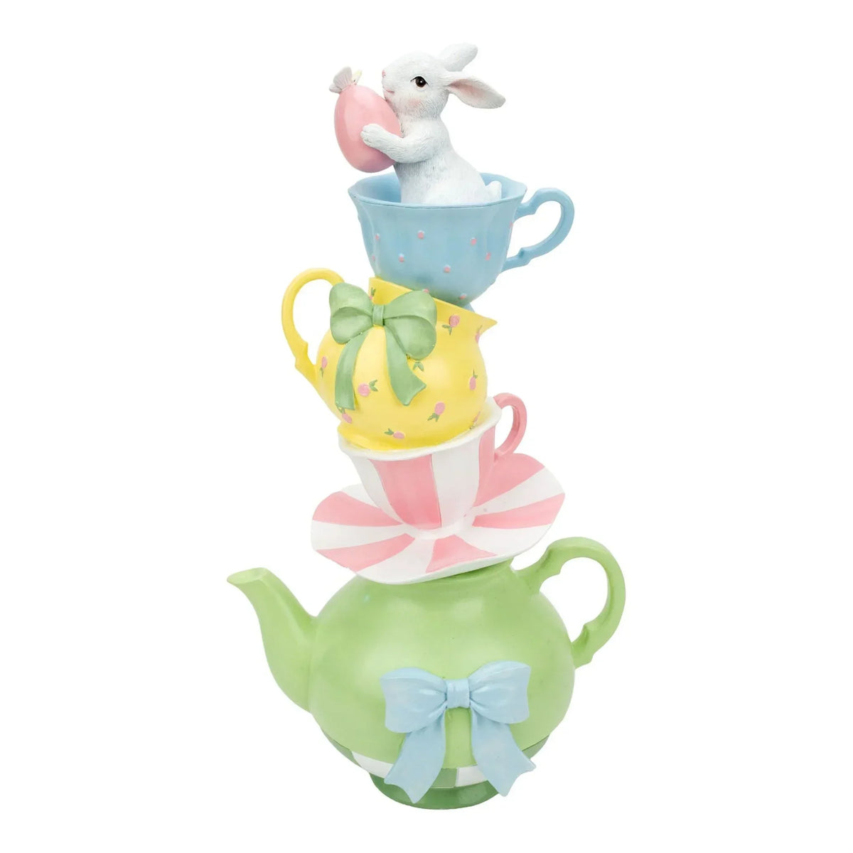 Charming Easter bunny holding pink egg, perched atop stacked pastel teacups and teapot with bows, perfect home décor