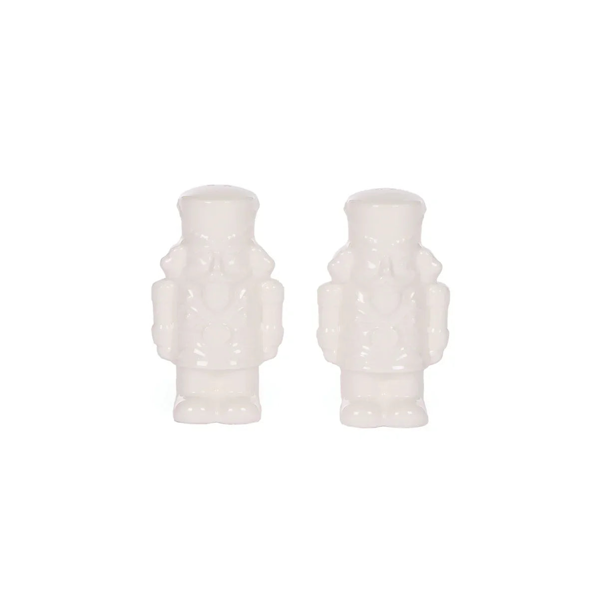 White ceramic nutcracker figurines, elegant holiday home decor for festive styling