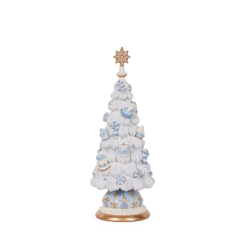 White ceramic Christmas tree with blue ornaments and gold star topper, festive holiday decor