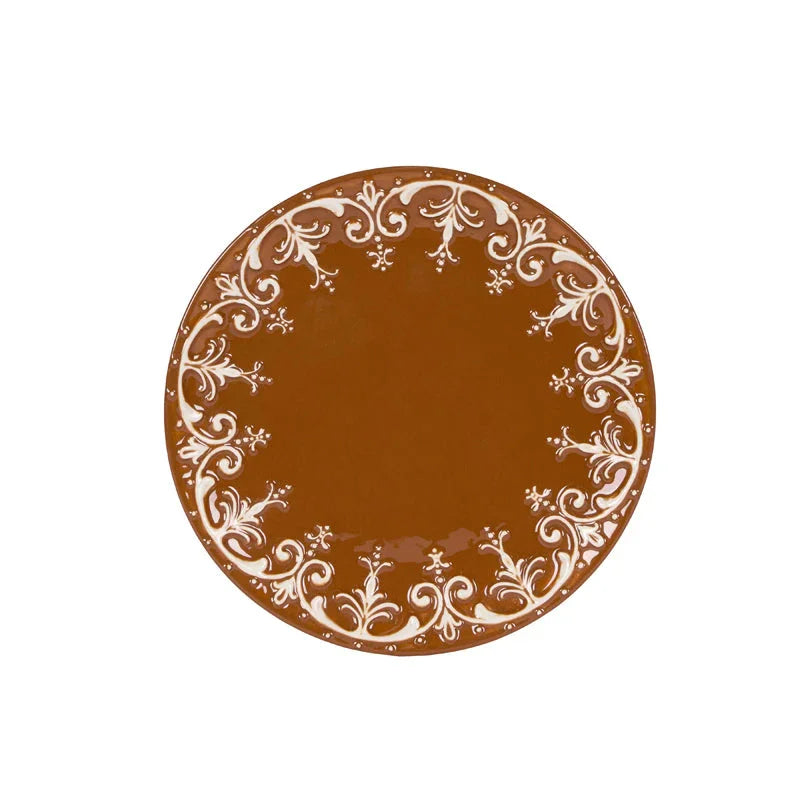 Elegant brown dinner plate with white floral scroll border, vintage-inspired home decor