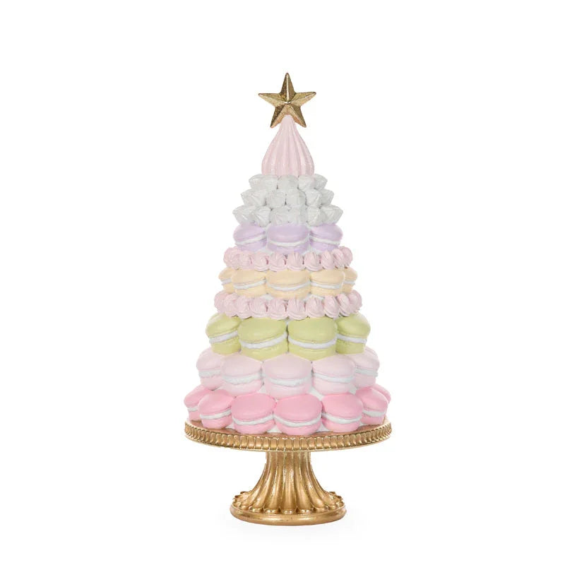 Pastel macaron Christmas tree decoration with gold star topper on ornate stand
