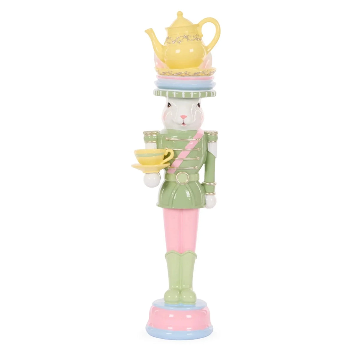 Pastel bunny nutcracker holding teacup, topped with teapot & saucers, vintage home decor accent
