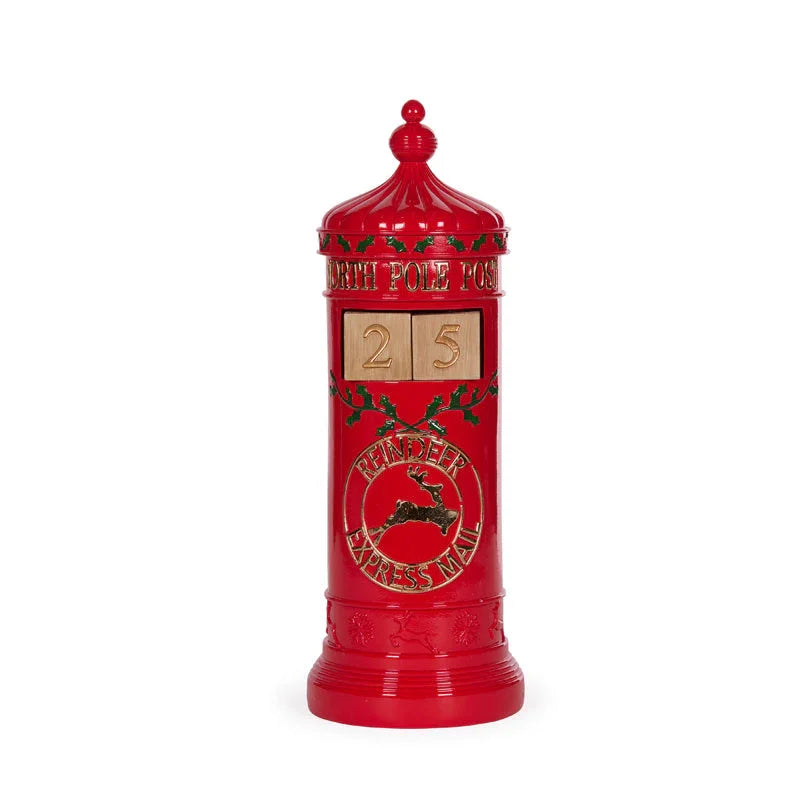 Red North Pole Post mailbox with reindeer emblem and wooden date blocks, festive holiday décor