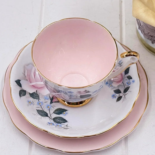 Pink floral teacup and saucer with gold trim, vintage-style home décor
