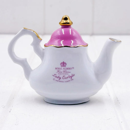 Royal Albert Lady Carlyle fine china teapot with pink lid and gold trim, elegant home décor piece