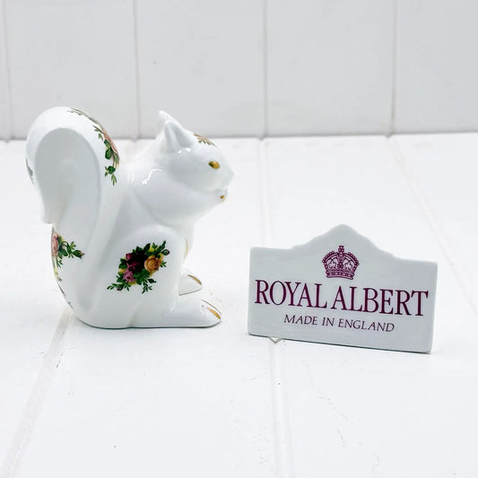 Royal Albert porcelain squirrel figurine with floral rose details, Made in England, elegant home décor accent
