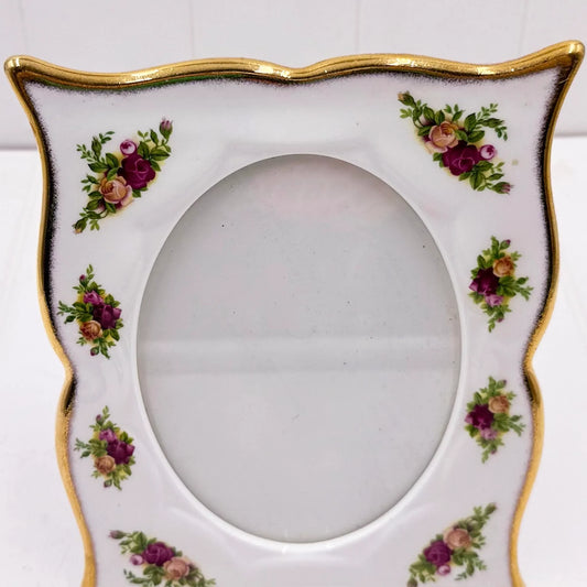 Elegant porcelain photo frame with gold trim and floral rose design, vintage home décor accent