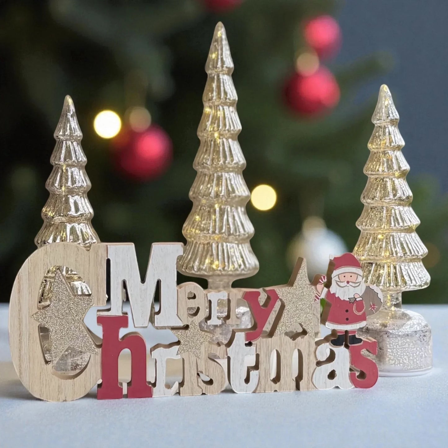 Merry Christmas wooden sign with glittery trees and Santa, festive holiday decor