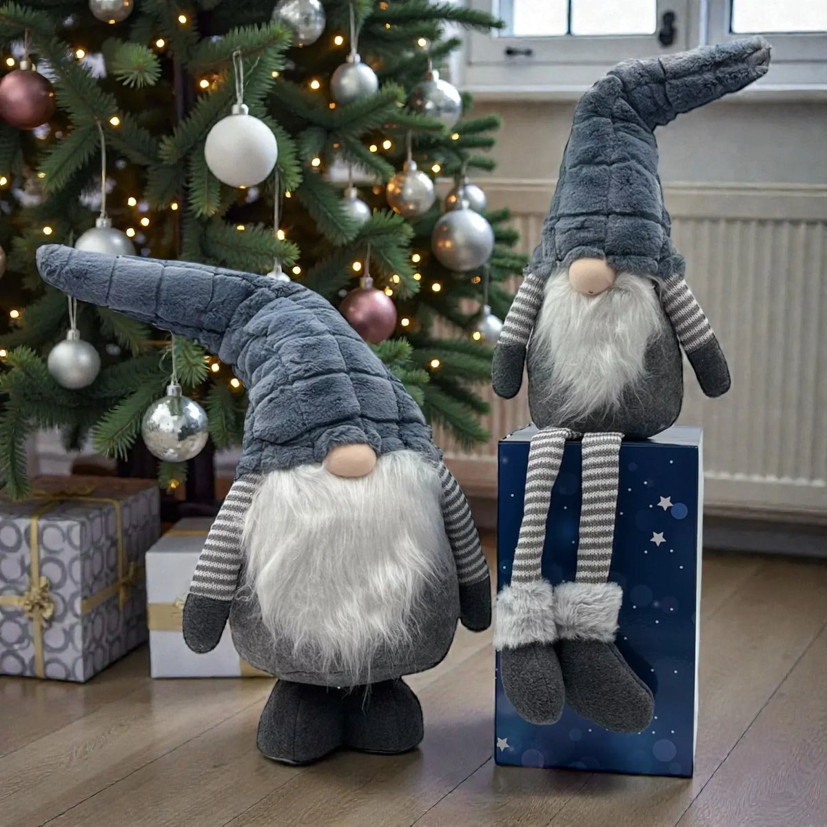 Gray plush gnomes with long hats and beards, festive Christmas tree decor, holiday home accents