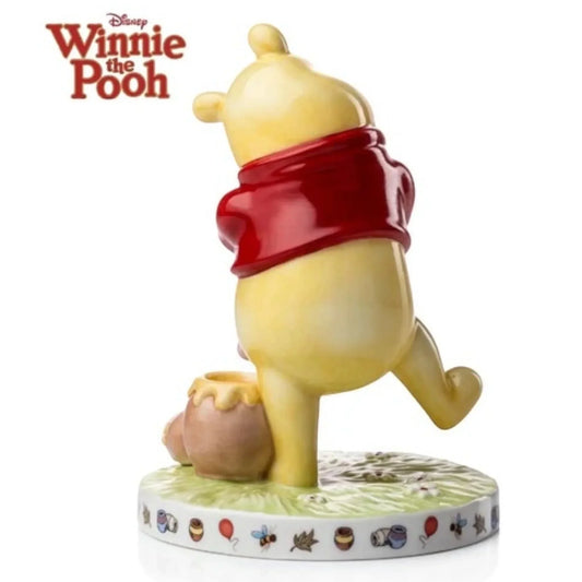 Winnie the Pooh figurine in red shirt holding honey pot, Disney collectible home decor