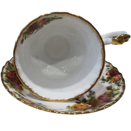Vintage floral teacup and saucer with gold trim, elegant rose pattern for classic home décor