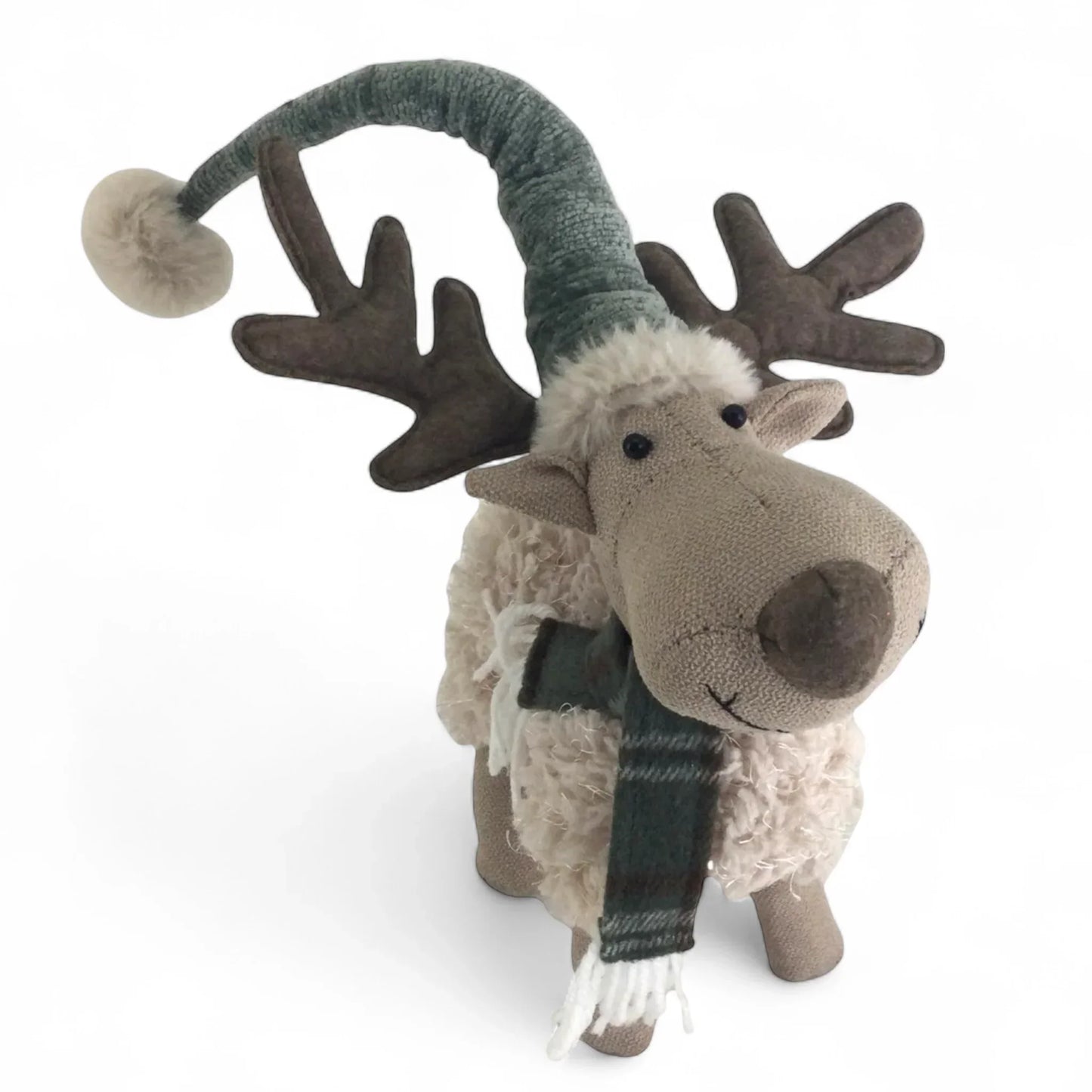 Plush reindeer with antlers, green hat, and scarf for festive home décor