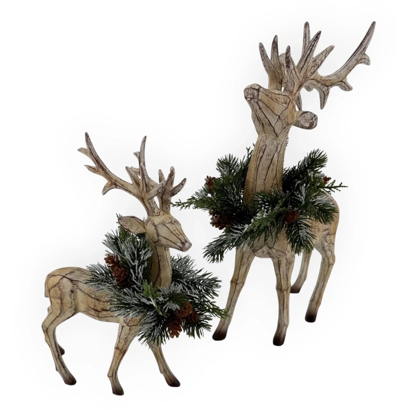 Rustic wooden reindeer statues with frosted greenery and pinecones, festive holiday home décor