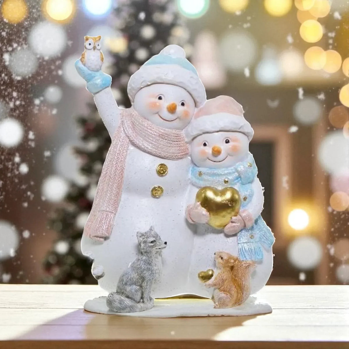 Charming snowman figurine with owl, fox, squirrel, and golden heart for festive home décor
