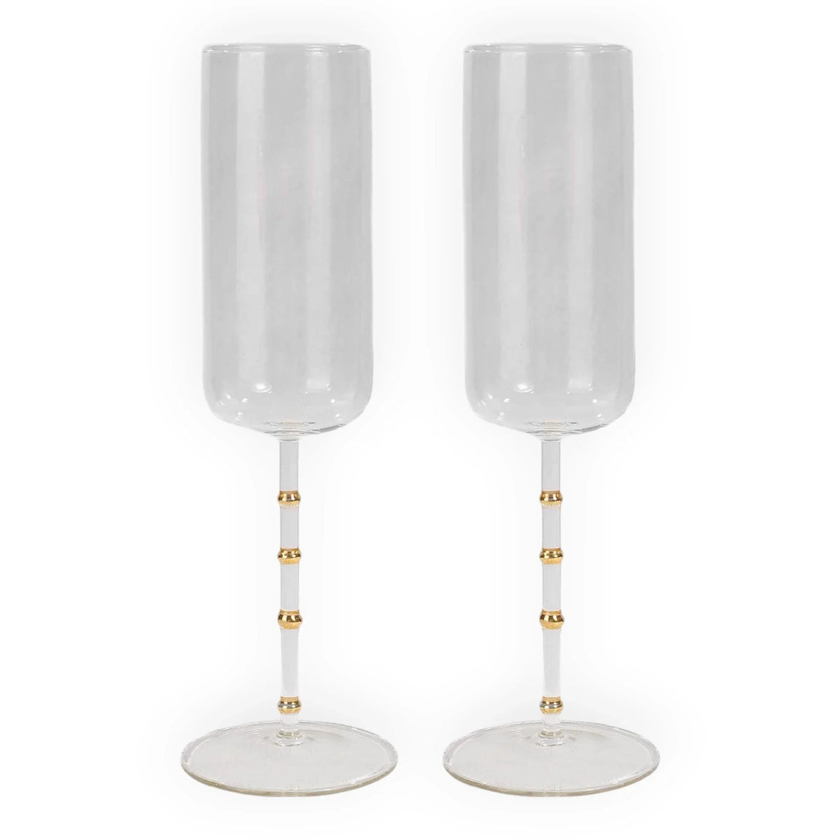 Elegant champagne flutes with gold accents, perfect for luxury home décor and special occasions.