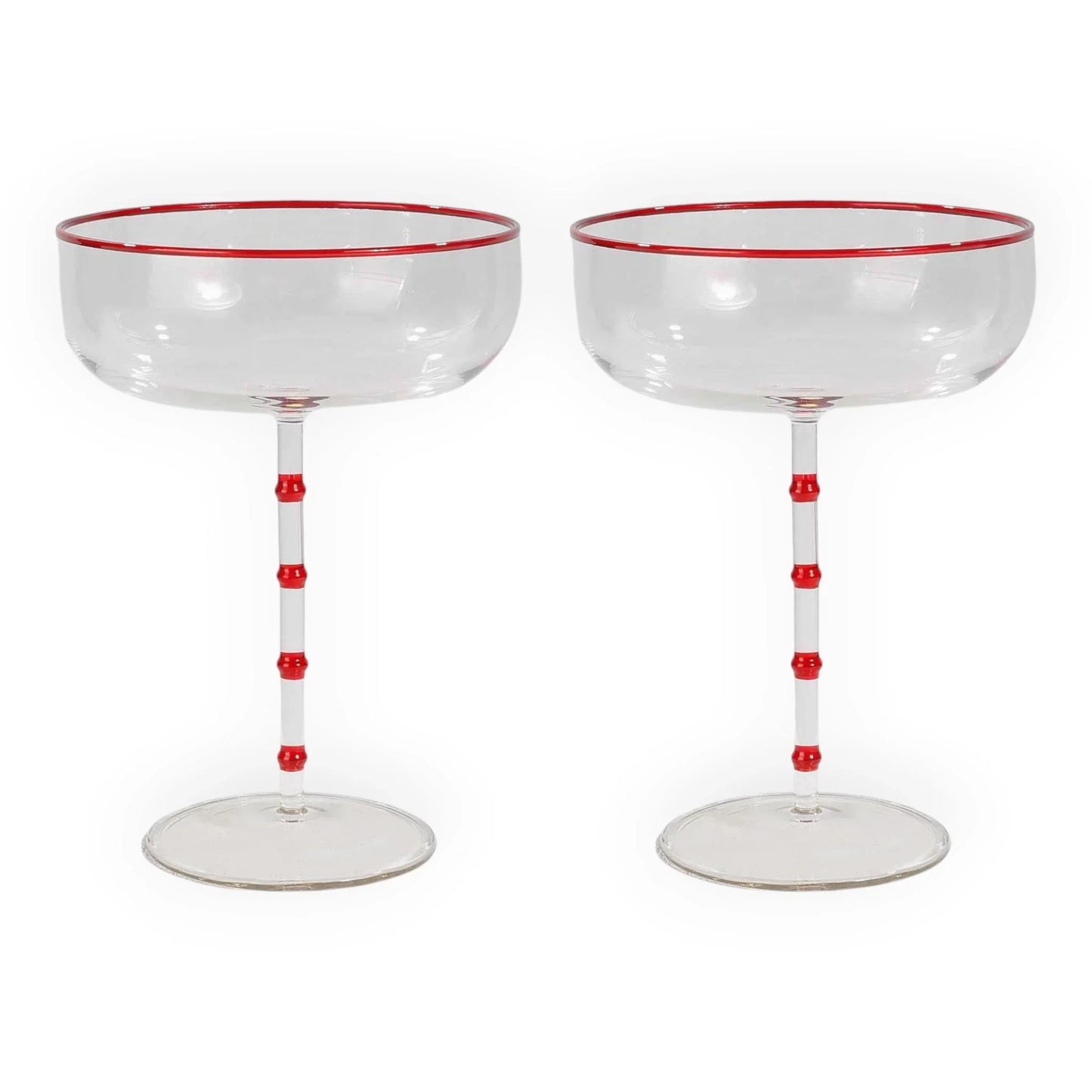 Red-rimmed coupe glasses with bamboo-style stems, elegant home barware for vintage-inspired entertaining.