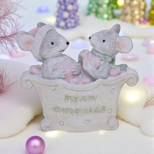 Merry Christmas mouse figurine with festive details and soft pastel accents