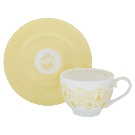 Elegant white teacup with gold 'Tale as Old as Time' script and yellow saucer, vintage-inspired home décor