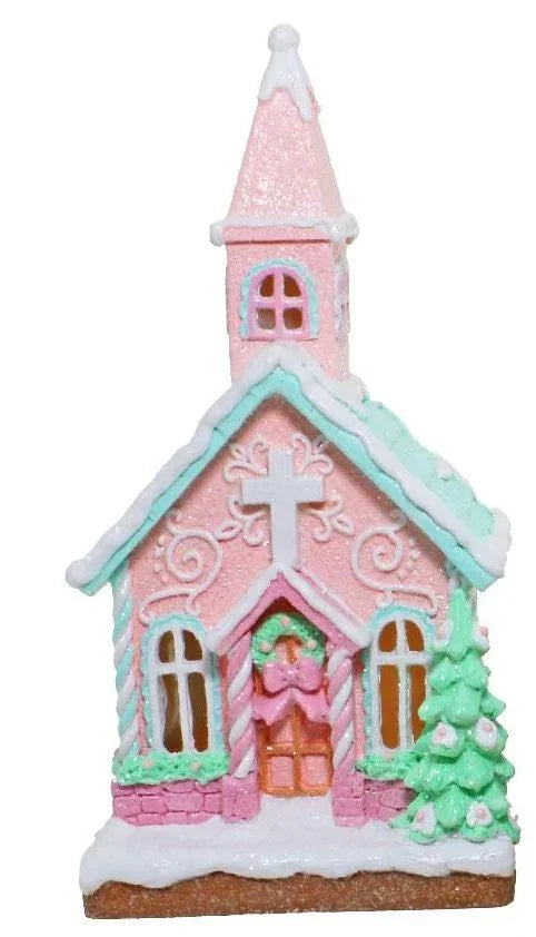 Pink gingerbread church ornament with mint trim, snow details, and Christmas tree, perfect for holiday décor