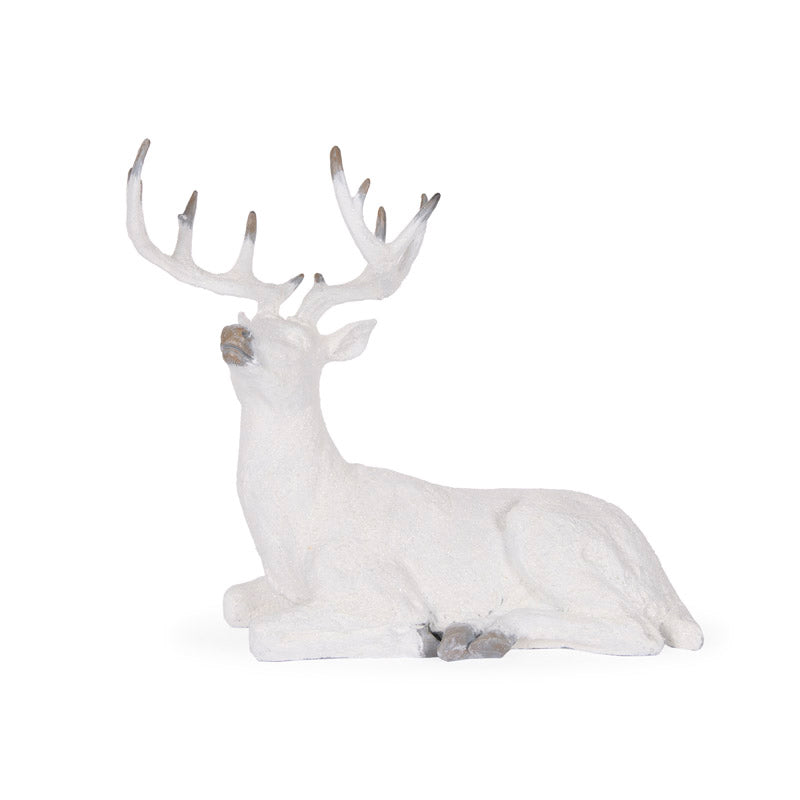 Snowy Reindeer Laying down