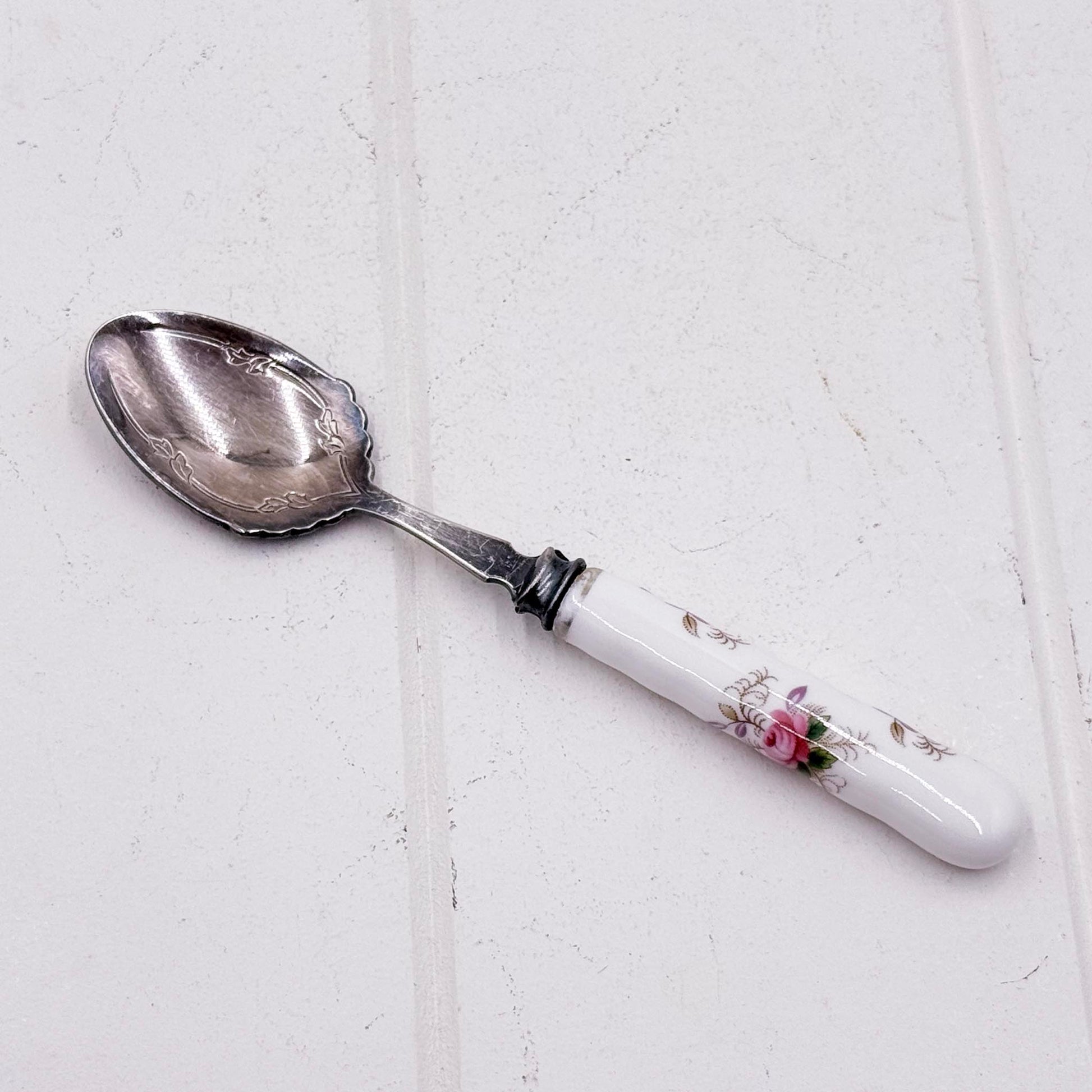 Royal Albert Lavender Rose jam spoon with silver plate bowl and porcelain handle featuring pink roses