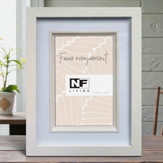 White wooden picture frame with 'Frame every moment' print, 4x6 inch, for home décor and wall art display