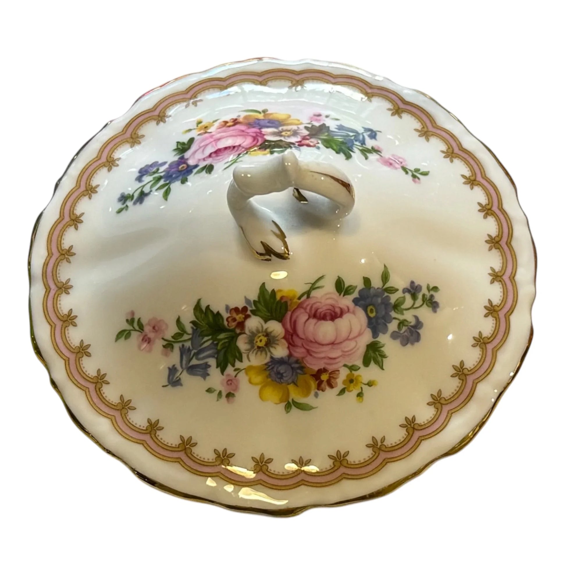 A vintage Royal Albert porcelain lidded serving dish, featuring a scalloped rim with gold detailing, a floral pattern with pink, blue, yellow, and green flowers, and a ceramic handle on top, set against a plain white background.