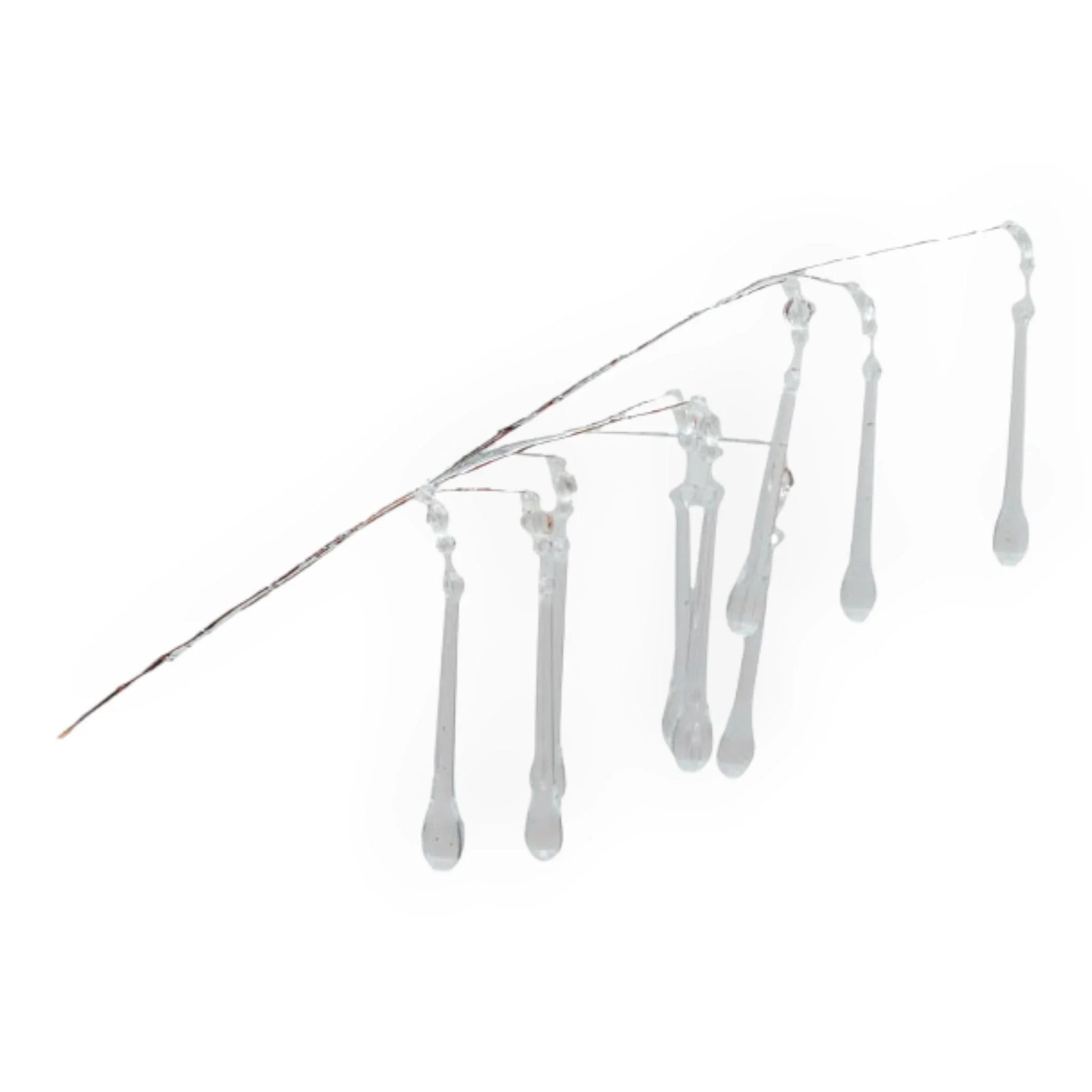 Clear glass icicle ornaments hanging from wire, elegant home décor for festive or vintage styling